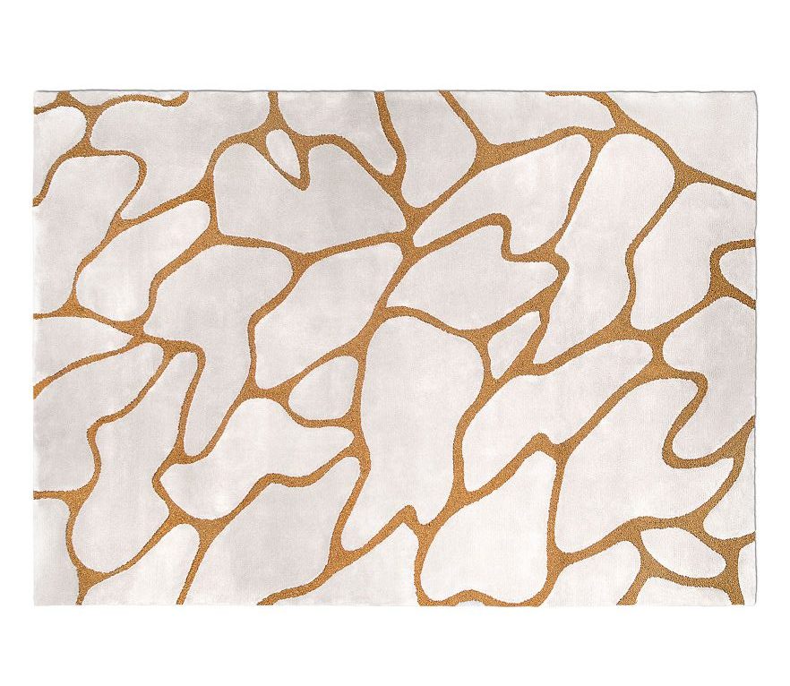 home decor ideas: modern contemporary area rug with white and golden accents and abstract pattern that resembles human cells