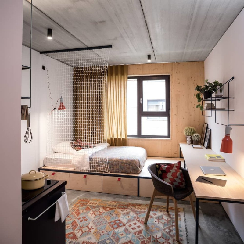 Studio Aisslinger: Unique Interior Design Projects with colorful rugs