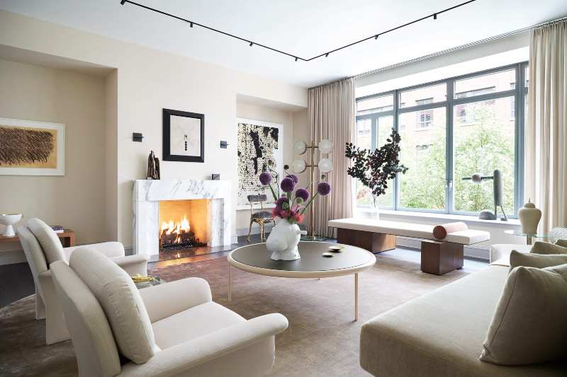 Rafael de Cárdenas, living room decor, white armchairs, wood center table, neutral rug