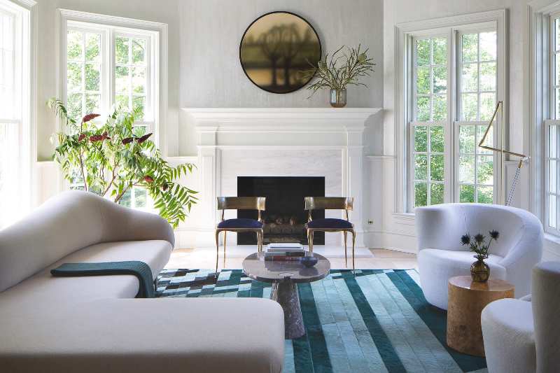 Rafael de Cárdenas, blue rug, white armchair, marble center table, white fireplace