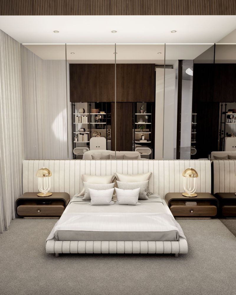 mid-century bedroom with a gray area rug that covers the whole floors and contrasts with the white bed.
