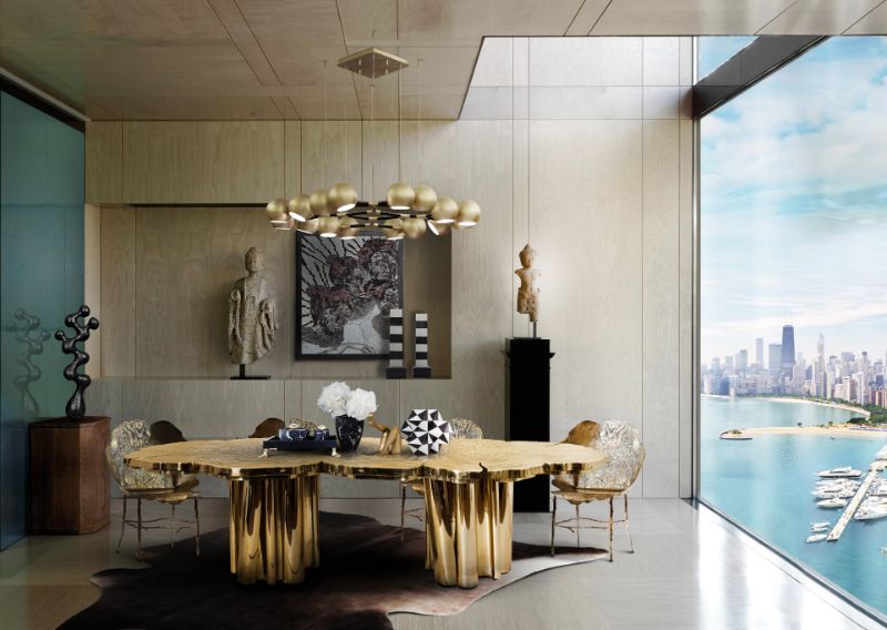 Modern classic dining room with leather rug and gold dining table