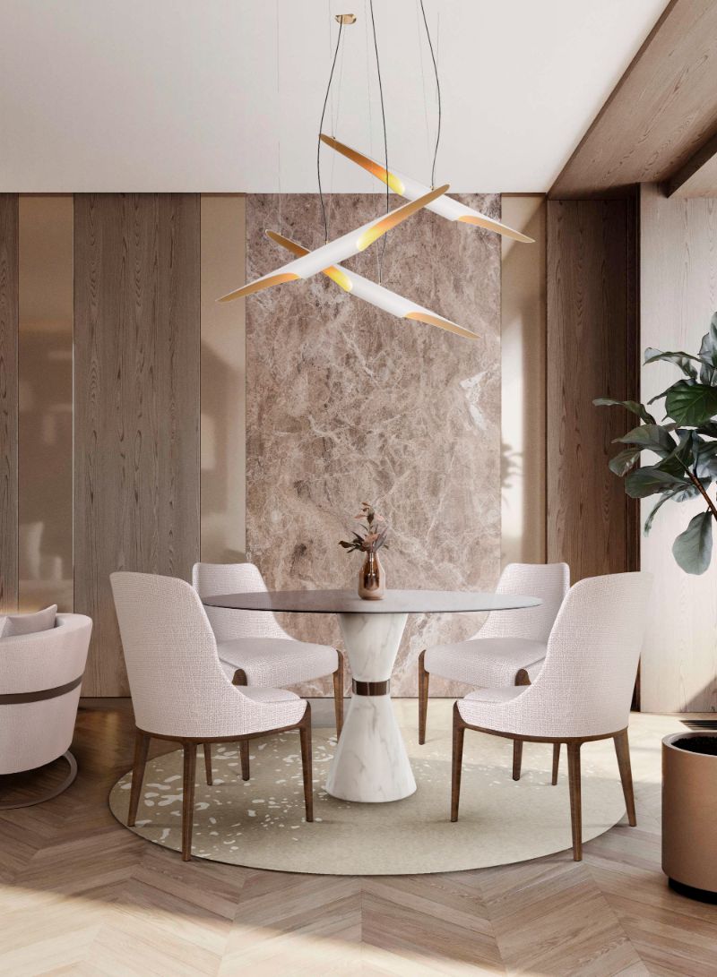 modern dining room with round rug and white chairs, round dining table