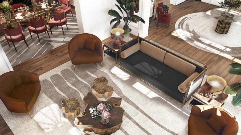 A Modern Rug in the Luxurious Crown Jewel Living Room. With neutral colored rug, brown-orange armchairs, black sofa, modern center table