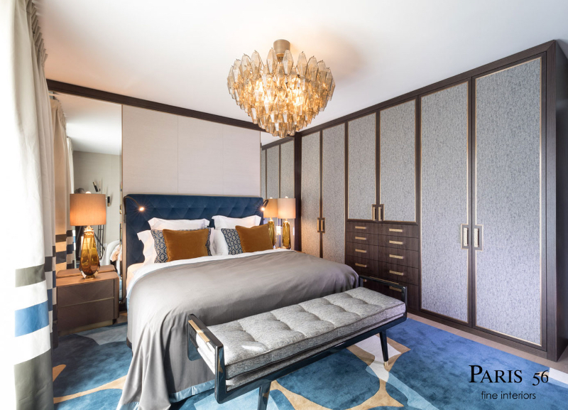 Paris 56 Fine Interiors with Fine RugsPANDION THE HAUS / Berlin Apartment bedroom with a rug that is similar to the living room, and also the same color palette.