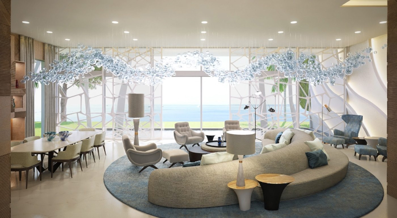 Paris 56 Fine Interiors with Fine Rugs; Villa Cape Antibes living room/ dinning room in blue tones with a round sofa and armchairs.