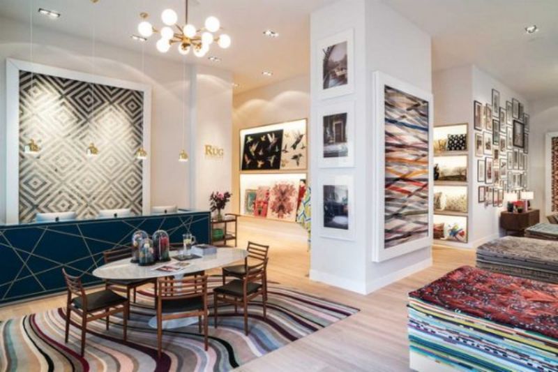 dining room with colorful rug