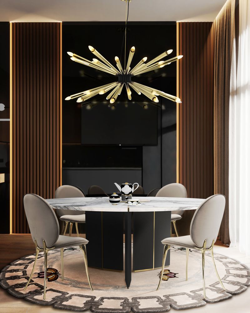 Modern dining room with round metamorphosis rug. Hanging light and round dining table.