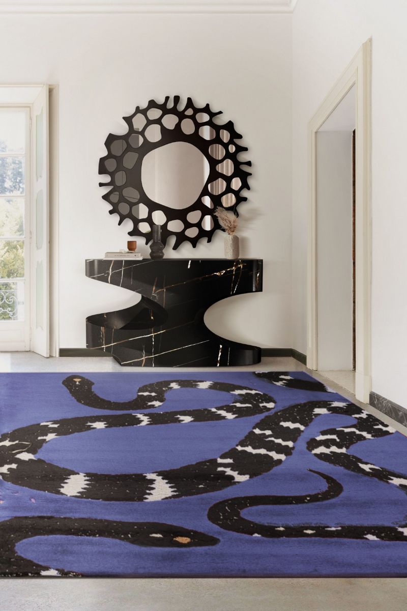 Modern classic entryway with Snake 8 Rug in very peri color with snake pattern and marbeld console