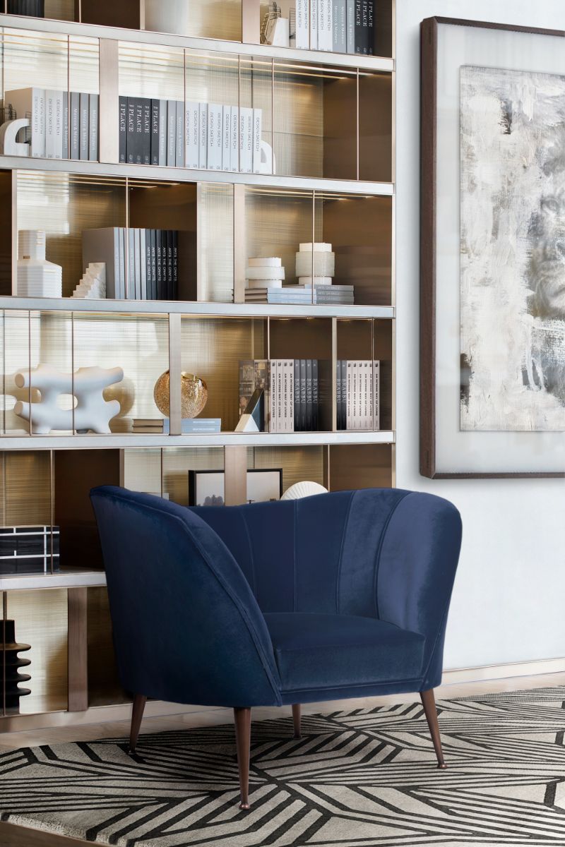 Modern  contemporary living room with Cauca Rug and blue armchair