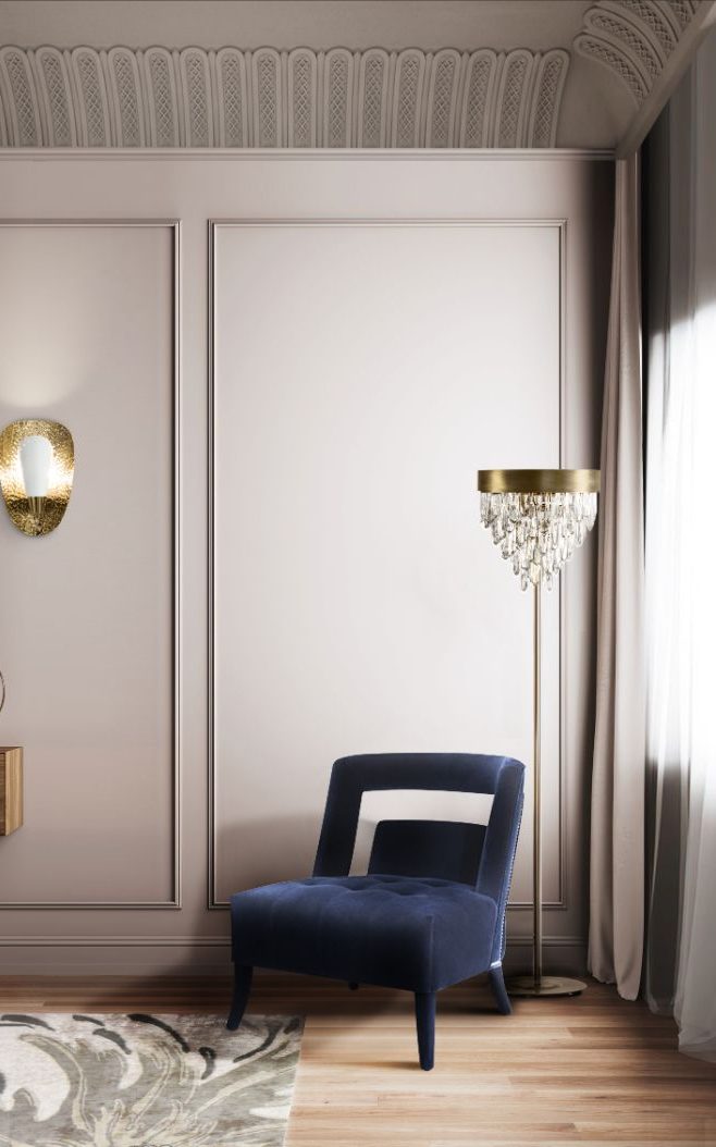 The Neptuno Rug in this living room corner with blue velvet chair and standing lamp
