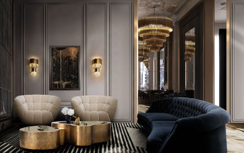 modern living room air rug with blue velvet sofa, essex armchair and gold center table