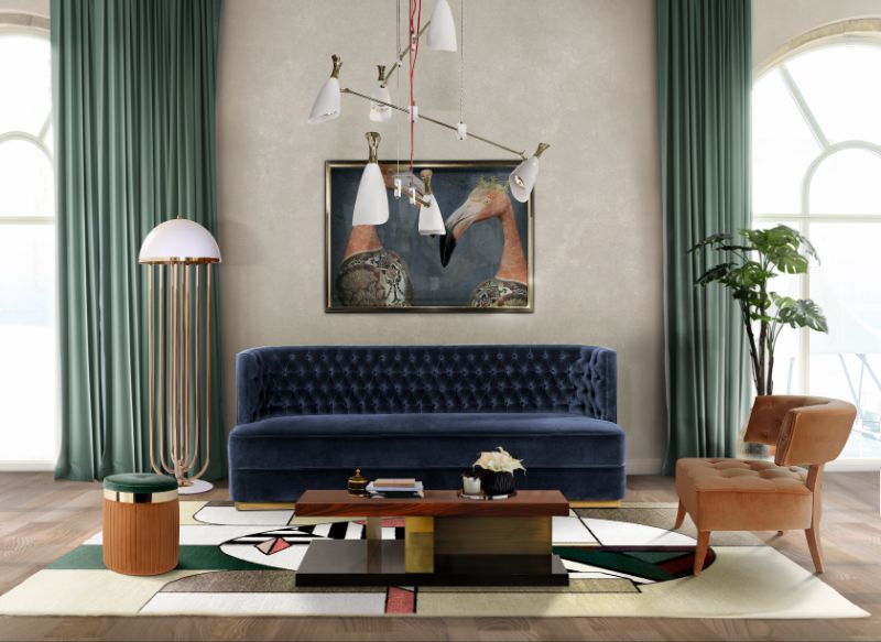 Modern contemporary living room with Oscar Rug, center table and blue velvet bourbon sofa