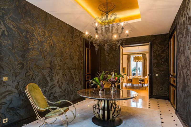 Gérard Faivre Paris Designs with Outstanding Rugs. Golden hallway with neutral rug