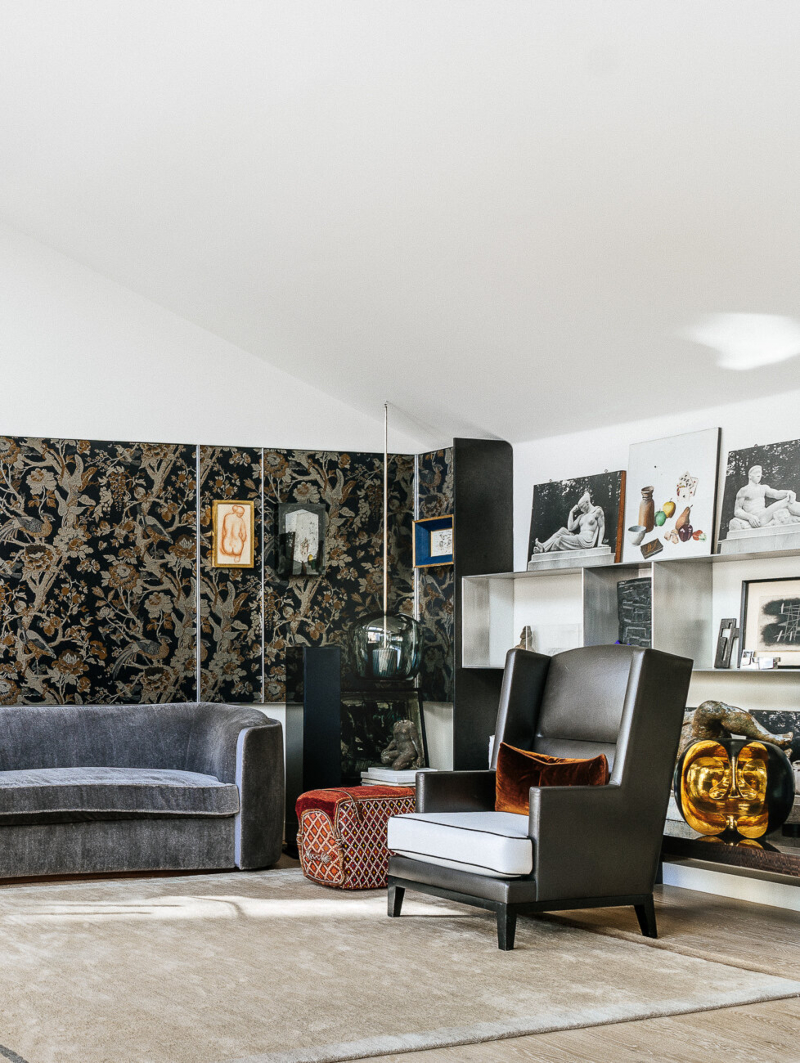 Rug Designs by Tristan Auer. Neutral lounge rug in a eclectic design and dark  armchair and sofa