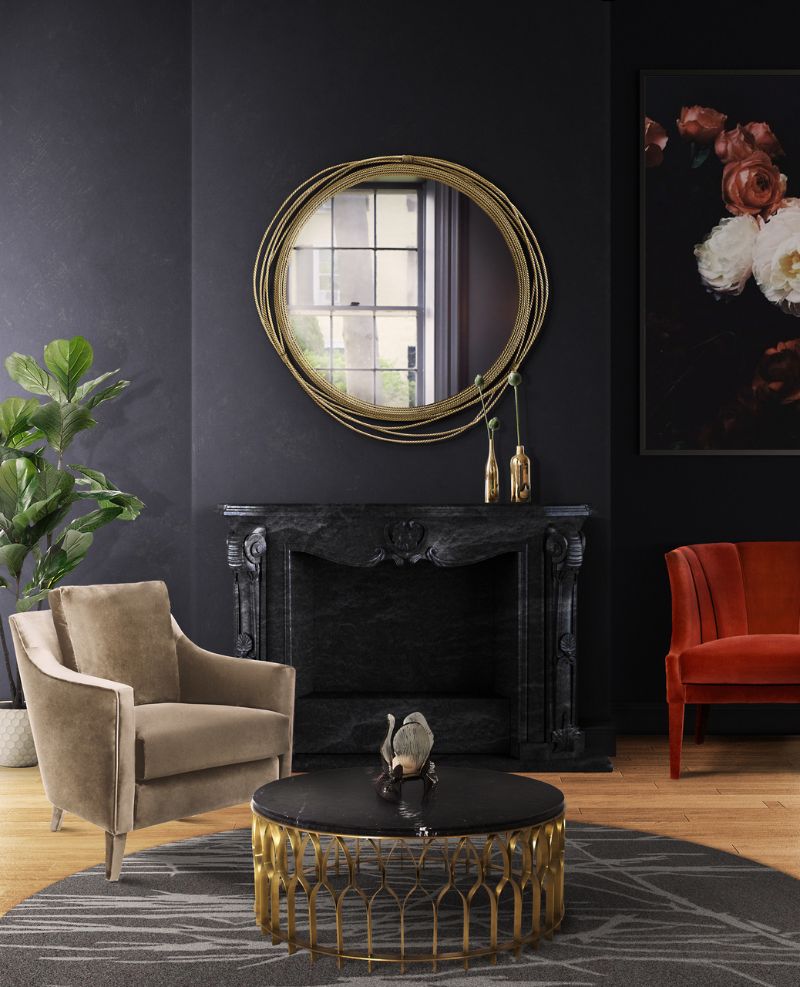Modern contemporary living room reading corner with the black round Inuk Rug 2 with the MECCA CENTER TABLE and armchairs. 10 Insane Modern Rugs For A Stylish Interior