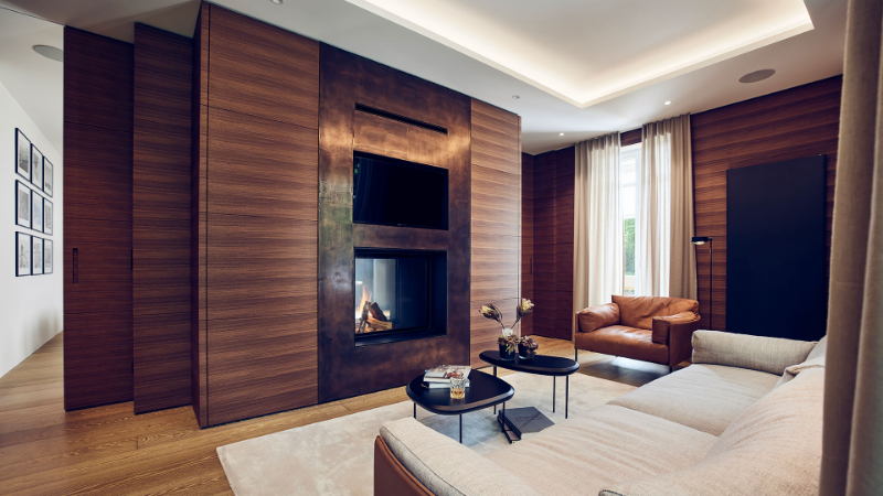 Gabriela Raible Innenarchitektur living room other view of the fireplace and the white rug