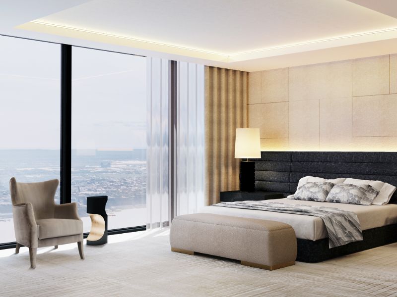 Bedroom Decor Ideas For A Modern New York Apartment with white area rug that covers the whole room's floor.