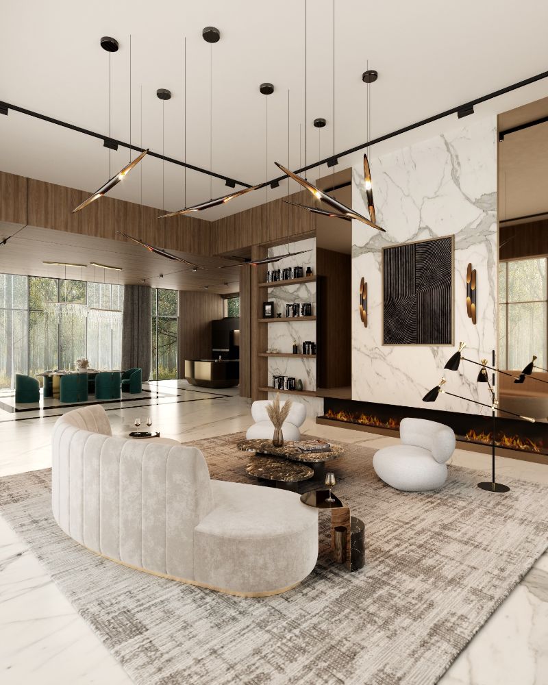 Modern contemporary living room with light gray area rug with an abstract pattern, curved sofa and center table with 2 armchairs on each side.