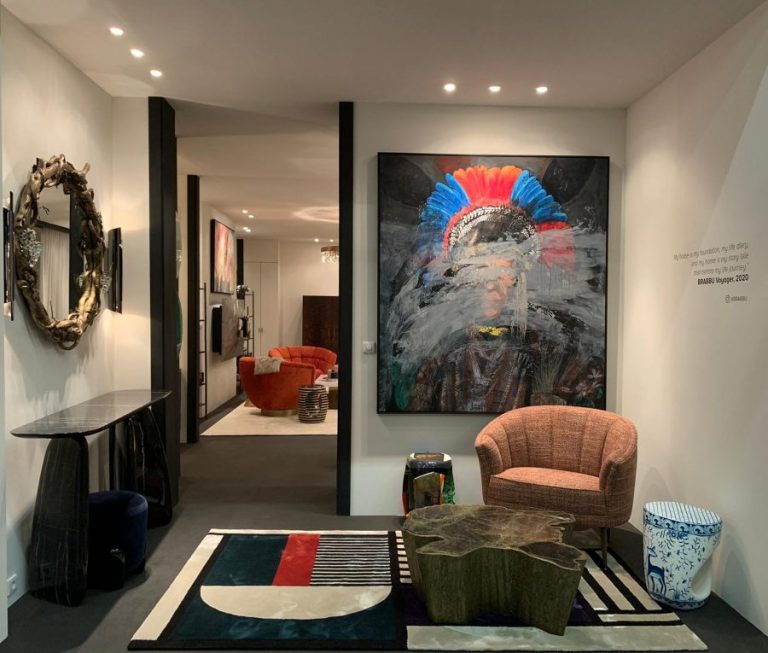 cozy reading corner with geometric rug in vibrant colors and with a armchair and center table.