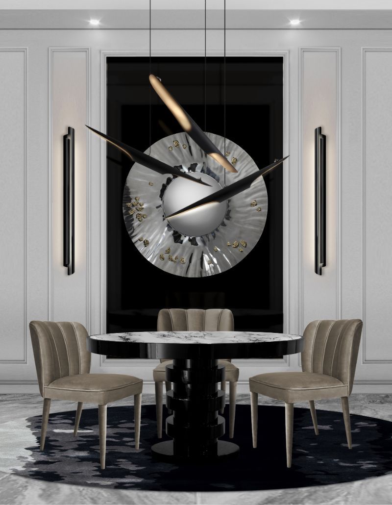 Modern contemporary dining room with black round rug and round dining table with a marbled top. The Best Modern Rugs To Match With Marble Furniture