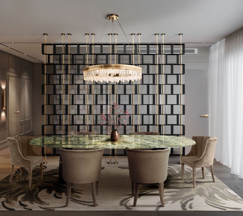 Green dining room with an area rug in earthy green tones and dining table. The Best Modern Rugs To Match With Marble Furniture