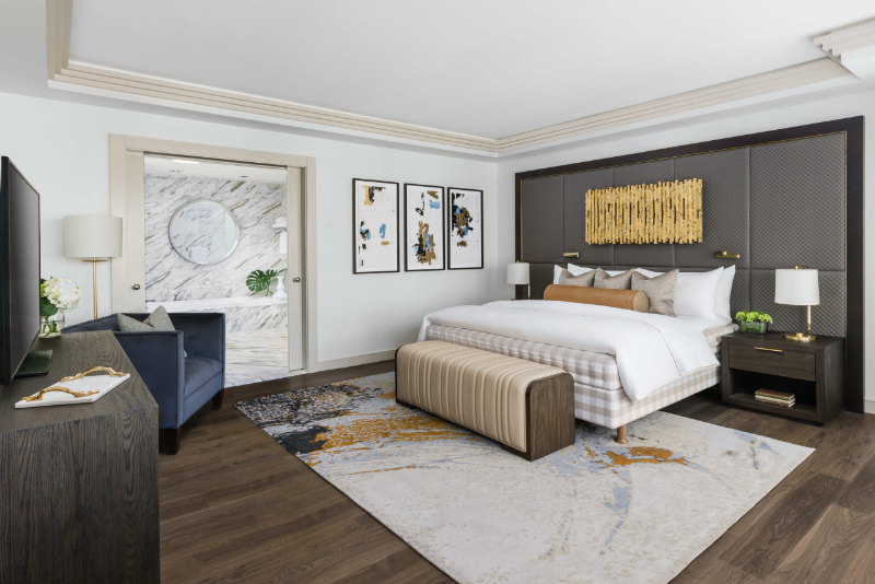 Forrest Perkins: Contemporary Rugs In Hospitality Projects. Hotel Room with a wide contemporary rug.