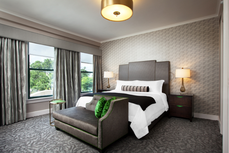 Forrest Perkins: Contemporary Rugs In Hospitality Projects. This hotel room's floor is covered in a beautiful gray rug.