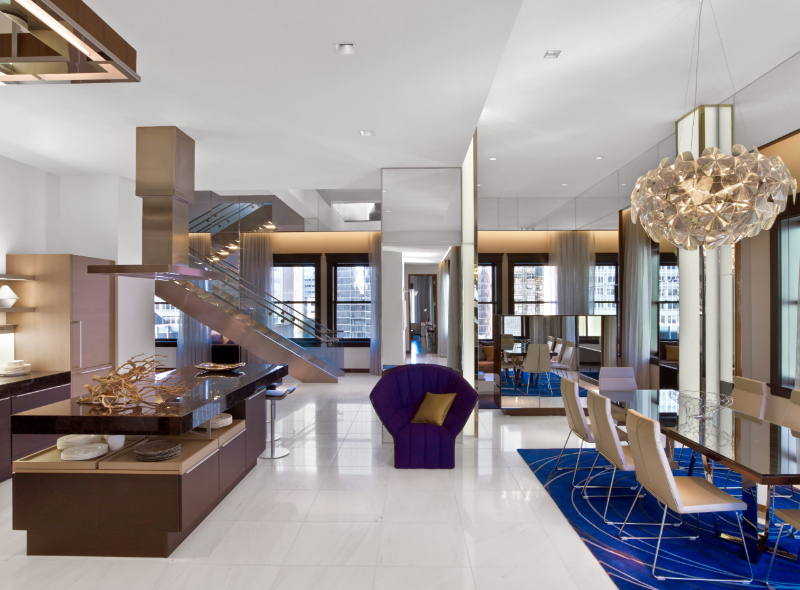 Forrest Perkins: Contemporary Rugs In Hospitality Projects. Dining area of the hotel with a vibrant blue rug.