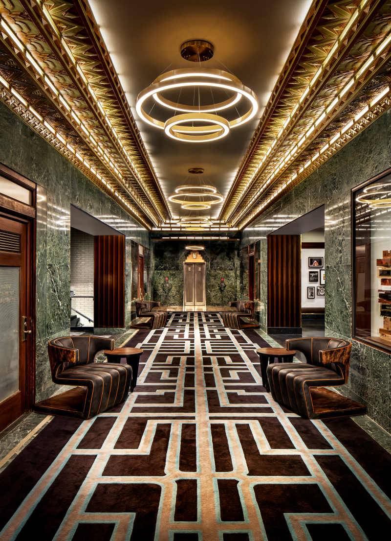 Forrest Perkins: Contemporary Rugs In Hospitality Projects. A majestic corridor design, with a fantastic rug with a geometric pattern.
