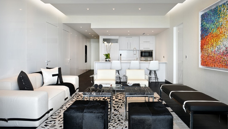 A stunning contemporary living area with modern accents and neutral colors that exudes elegance and comfort. Here you can see another amazing project by Fede Design.