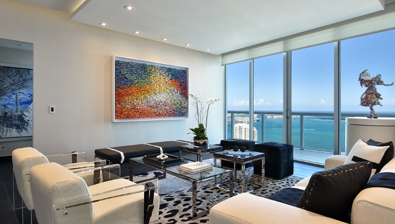 A stunning contemporary living area with modern accents and neutral colors that exudes elegance and comfort. Here you can see another amazing project by Fede Design.
