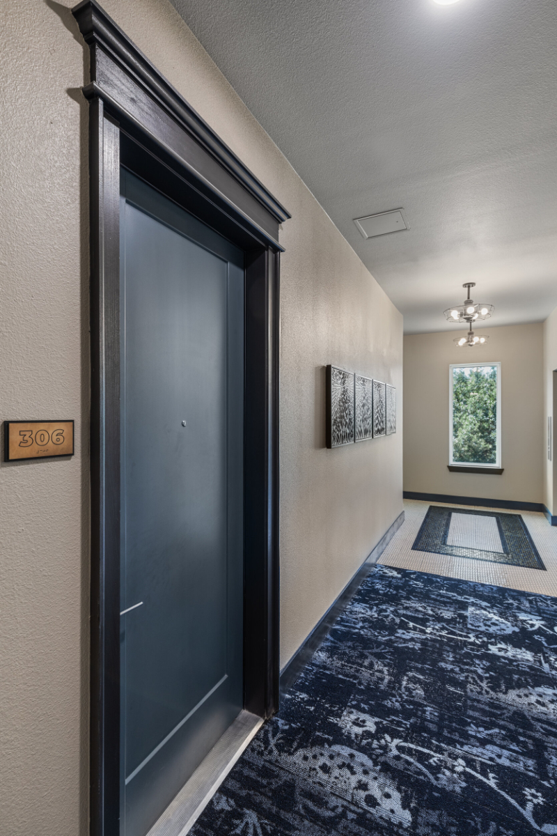 Rug Design Inspiration From Faulkner Design Group. On this hall there is a beautiful blue-toned rug that gives a cozier feeling to this space.