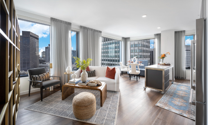 Rug Design Inspiration From Faulkner Design Group. This is an open space, there's the kitchen, the living area, and the dining area. Two beautiful rugs can be seen in the kitchen and living zones.