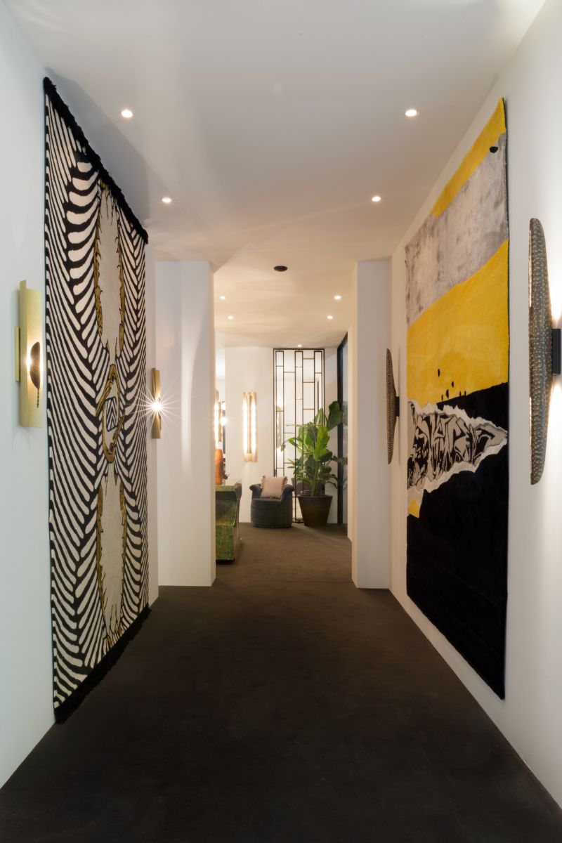 The Best of iSaloni 2022's Interior Design Trends. Art gallery with rugs.