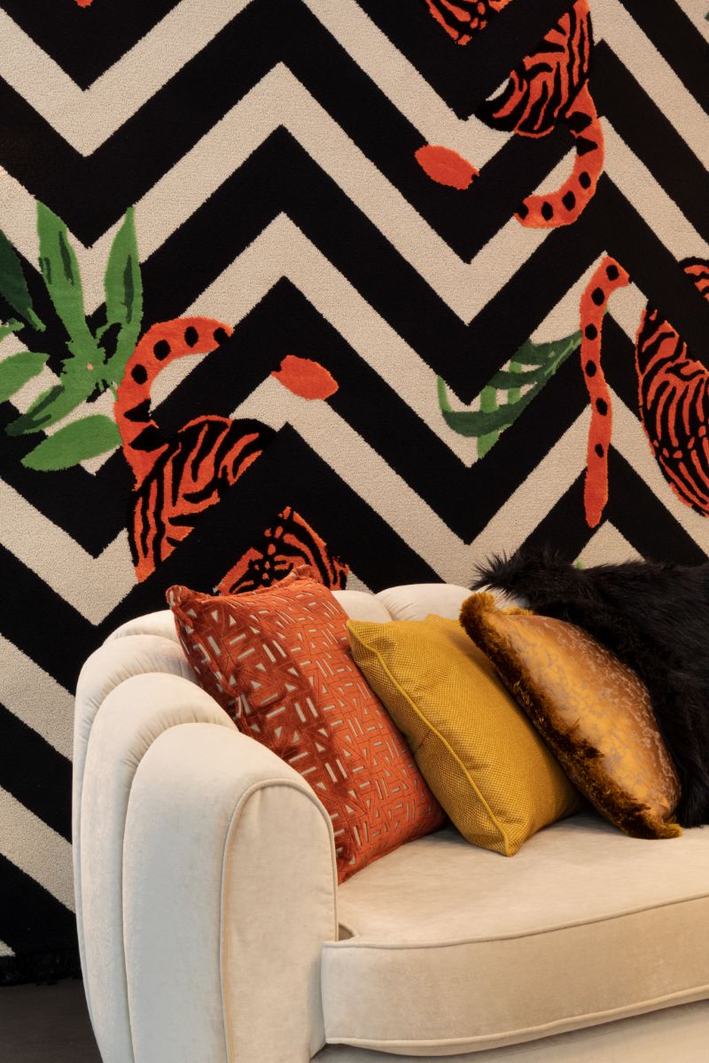 The Most Mesmerizing Design Moments of Salone del Mobile. Modern rug in black and white with a pop of color and tiger design.