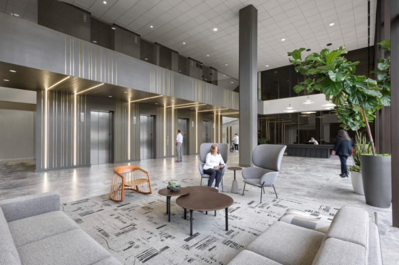 Abel Design Group: Rug Design Inspiration. In this hotel lobby there's a large rug on the living area with the sofas.