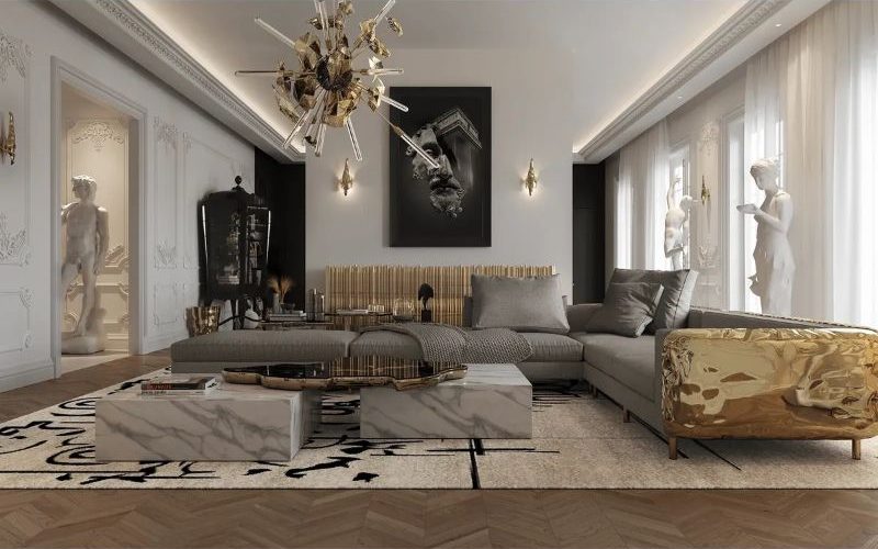 8 Fall Rugs We Love For The Living Room with area rug in beige with golden sofa and marble center table
