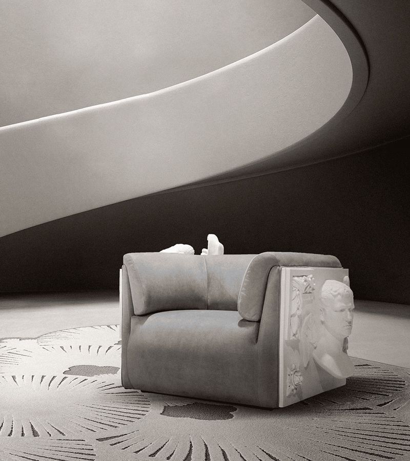 8 Fall Rugs We Love For The Living Room, Reading corner with white and gray rug and armchair