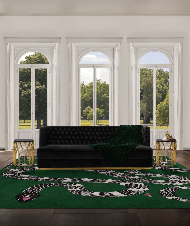 biophilic interior design with green rug and modern sofa with gold side tables