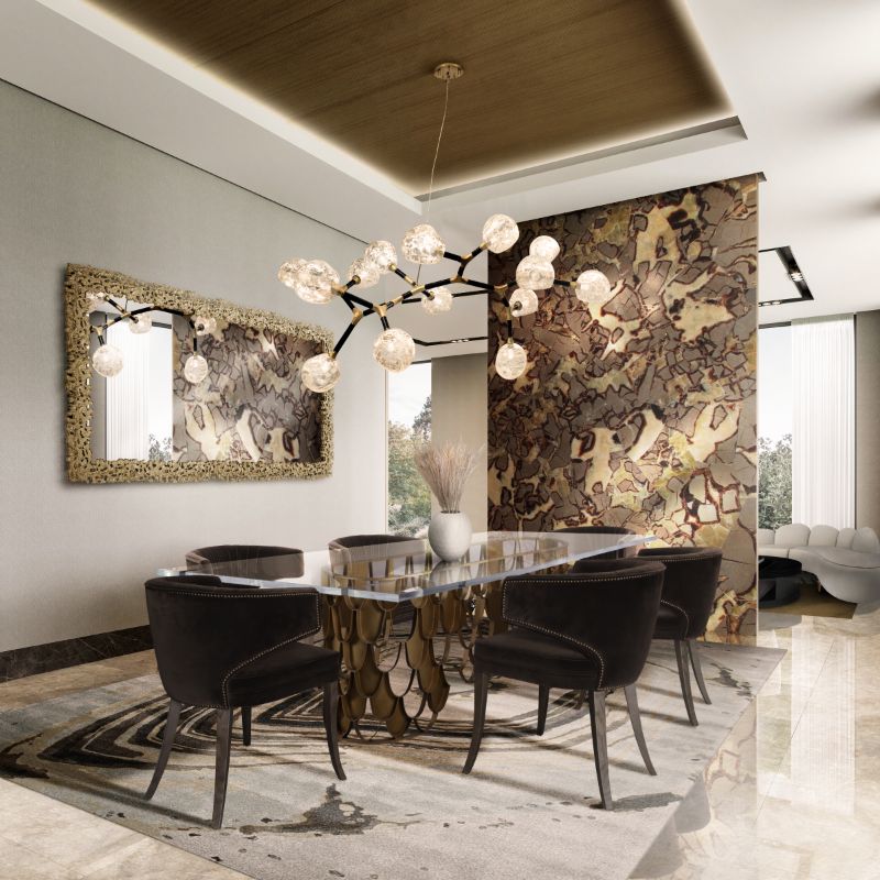Handmade rugs like the AGATHA RUG add a beautiful ambiance to a dining room. The abstract pattern of the rug has a fluid movement that makes this room feel refreshing.