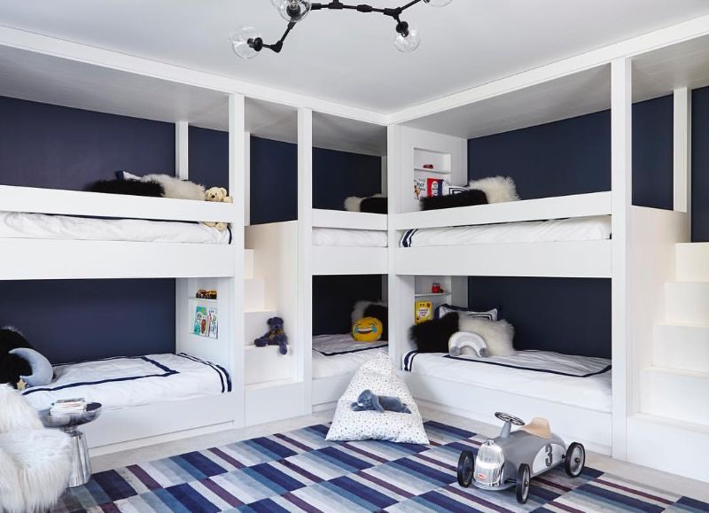 Maxine Tissenbaum And The Art of Bespoke Interior Designs. blue and white geometric rug for kid's bedroom