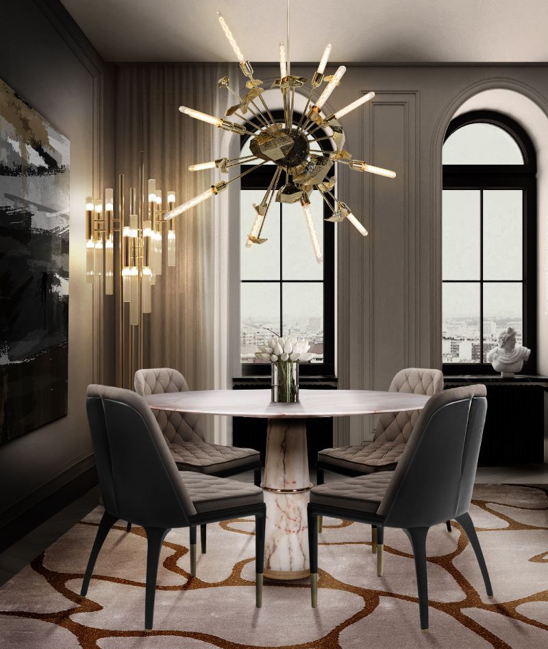 modern rugs: Dining room design with white and orange area rug.