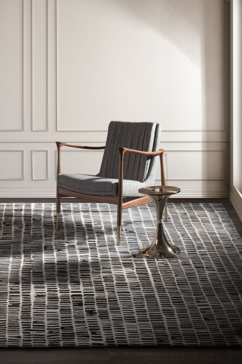 Minimalist interior design with black and white modern rug that is timeless. Modern Rugs For A Chic and Timeless Decor