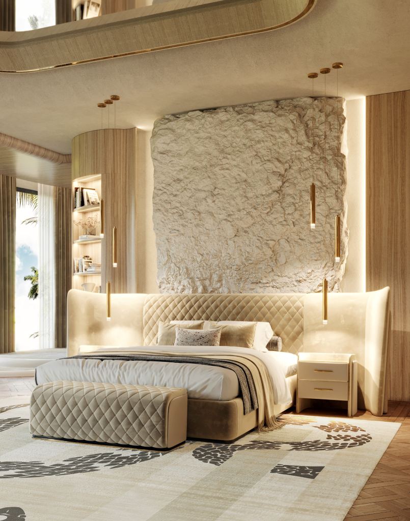 Imperial Snake rug, a 100% handmade contemporary rug in cream botanical silk with intricate mythological motifs, anchoring a luxurious bedroom with plush bedding and textured stone walls