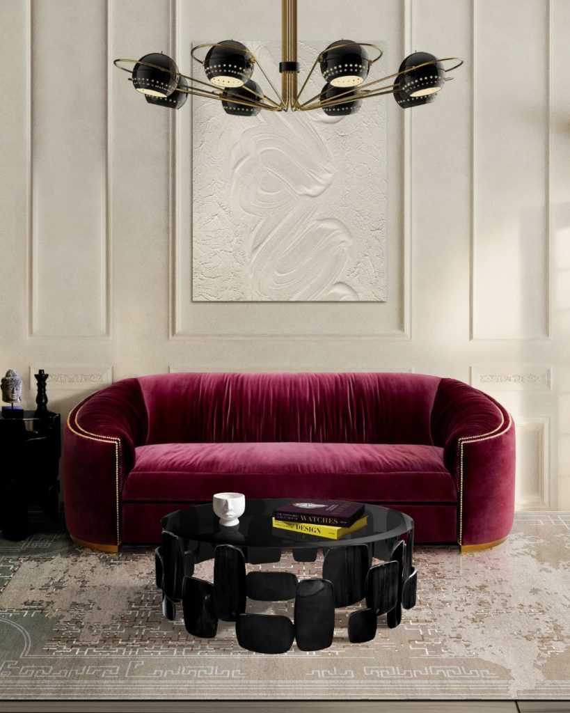 20 Clever Ways to Decorate Your Living Room with Modern Wool Rugs. Modern living room with ruin rug, gray rug, black cofee table, burgundy couch, dark red sofa