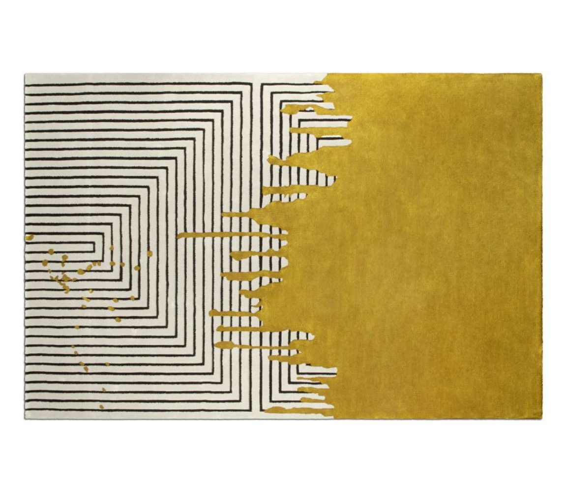 black and white rug with a touch of gold, the valencia rug is fabulous and luxury. 8 Ideas on Living Room Designs For 2023