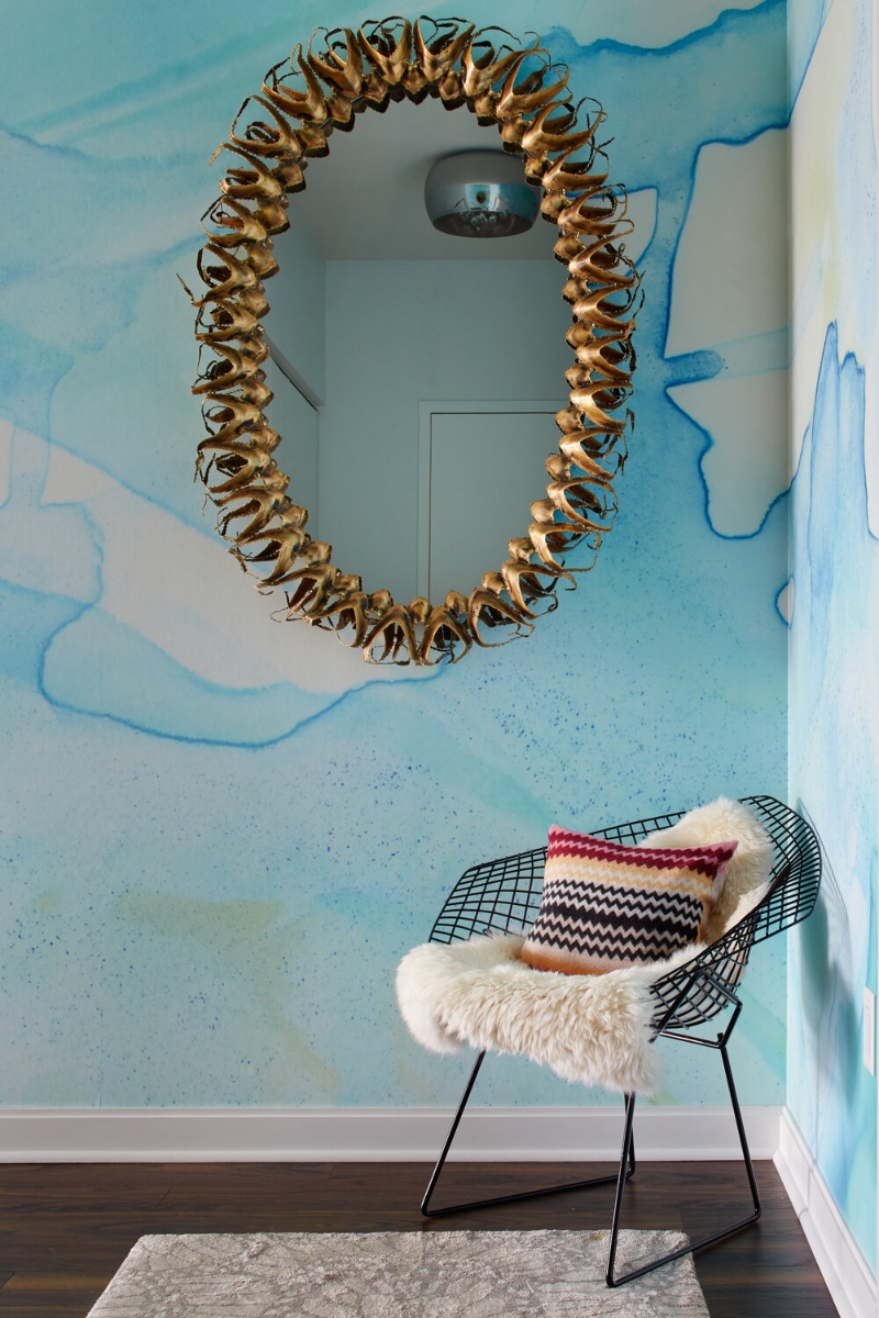 Reading corner interior design in blue tones with neutral rug