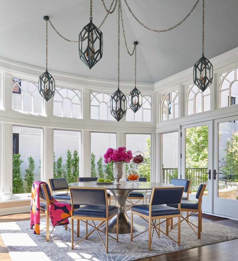 Big dining room interior design with a central rug