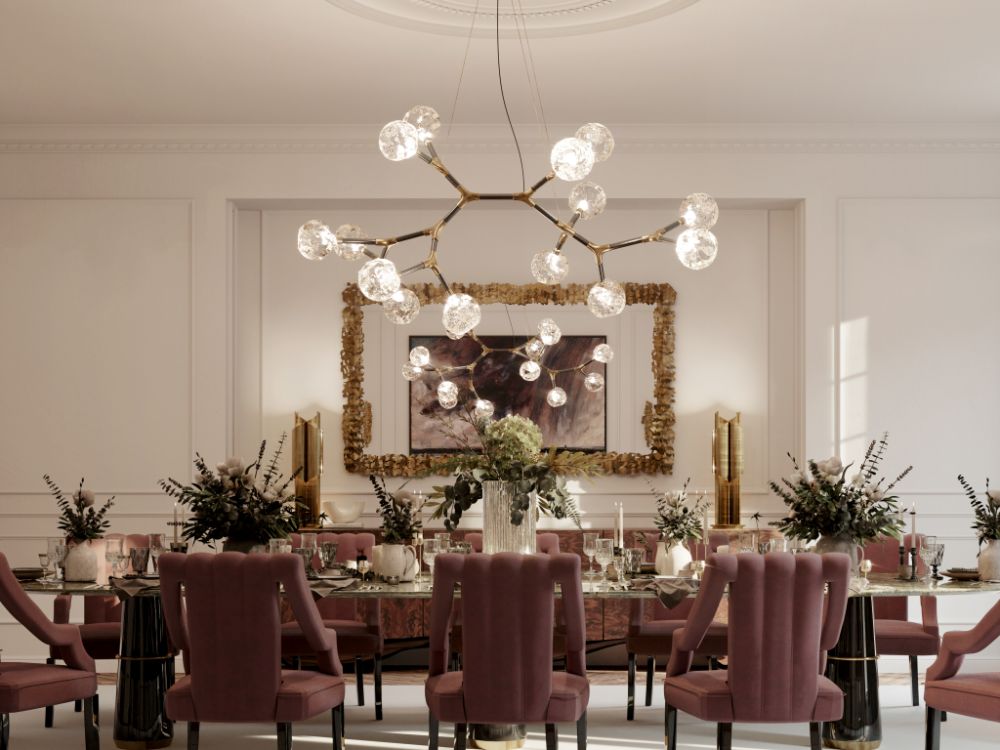 Luxurious dining room with area rug, gray dining chairs and glass dining room table